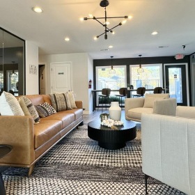 Settle into comfort at LYV Chapel Hill spacious clubhouse with couches